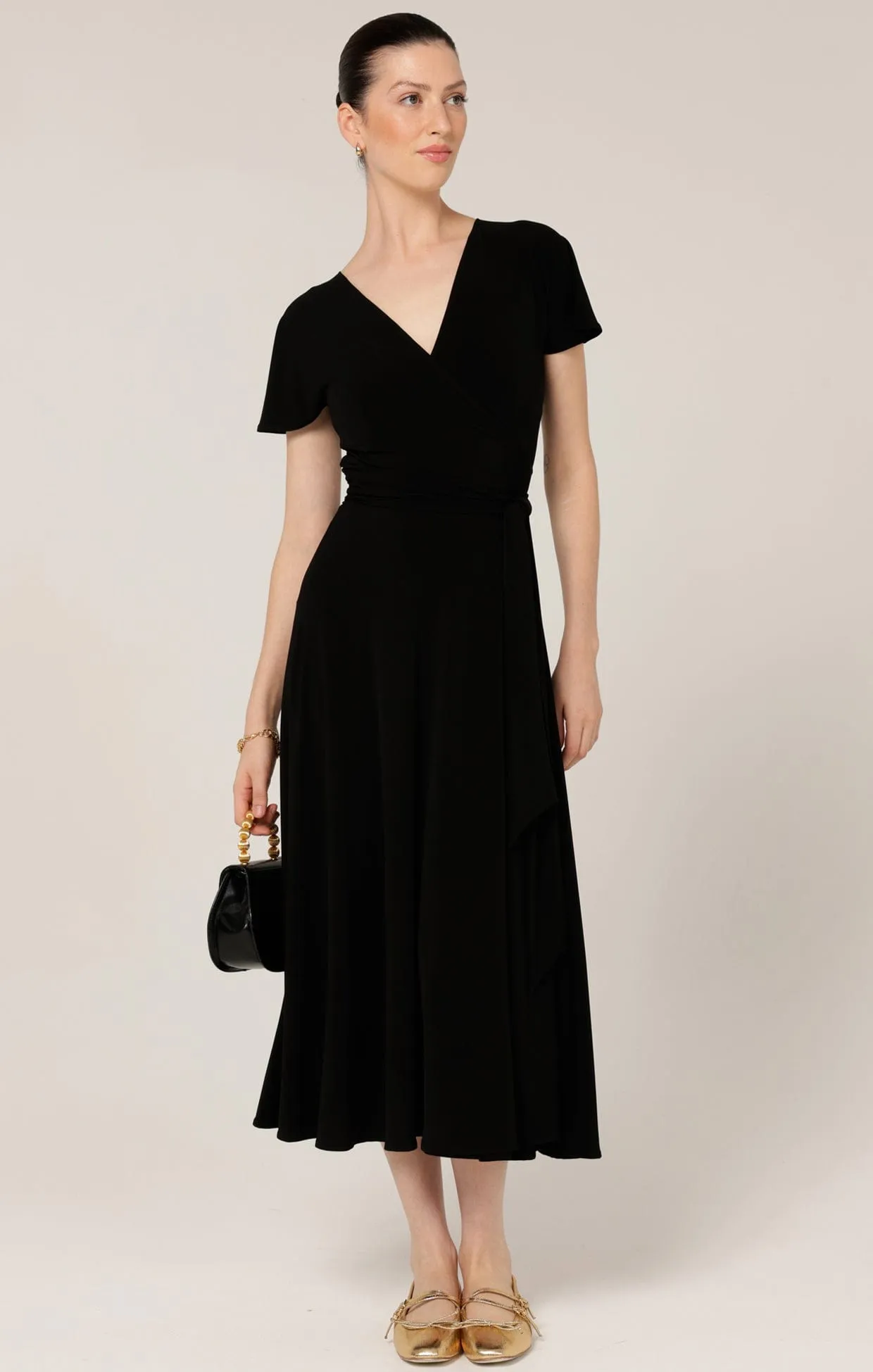 FLUTE SLEEVE REVERSE WRAP IN BLACK